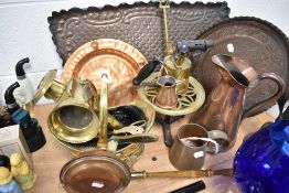 An interesting group of brass and coppers wares, to include copper trays, brass carriage lamp,