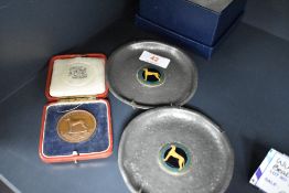 A cased copper 'Great Dane Club-The Northern' medallion, sold together with a pair of planished