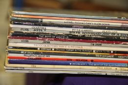 A lot of twenty random records with rock and pop interest