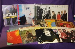 A lot of twelve various albums - Clash , Lou Reed and more
