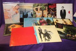 A lot of 12 albums with titles from Roxy Music , Fleetwood Mac and more