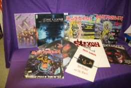 A lot of Iron Maiden / Metal / Rock interest on offer here with some tour programmes also in the lot