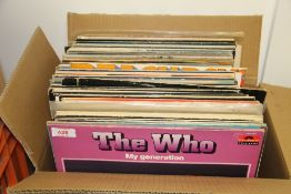 A large box of mixed albums - Rock , Pop and more on offer here - a mixed bag - Viewing is