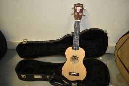 A Sunwolf ukulele and hard case