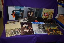 A job lot of fifteen albums - rock , pop and more