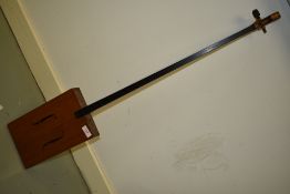 A cigar box diddley bow
