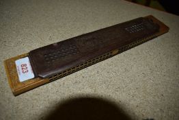 A vintage harmonica 'Ands Kochs Famous Giant Harmonica'