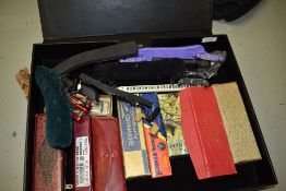 A case of vintage harmonicas etc