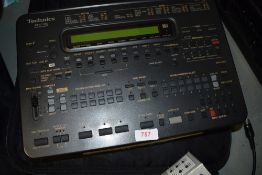 A Technics SM-AC1200 midi orchestra desk top console unit, with bag and accesories