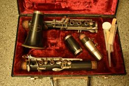 A traditional clarinet, cased , not named