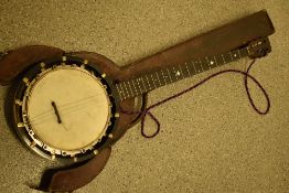 A late 19th or early 20th Century 5 string banjo , stamped J E Dallas, 415 Strand. Serial number