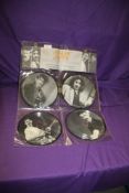 A four disc interview set in presentation wallet - Frank Zappa interviews on nice picture discs