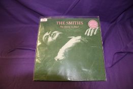 An original UK gatefold issue of The Smiths ' the Queen is dead ' on Rough Trade