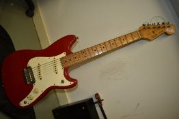 A 1996/1997 Mexican Fender Duo Sonic, in red, serial number MN616064