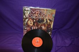 A UK Red Elektra label of the MC5 ' kick out the jams ' album EKS 74042 VG / VG - would benefit from