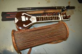 A selection of instruments including saxaflute and mini sitar