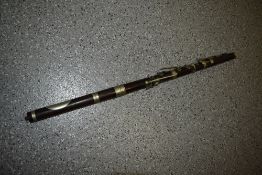 A late 19th or early 20th Century 5 piece rosewood flute, no makers mark, some damage but still