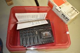 A vintage TASCAM Porta One Ministudio 4-Track Cassette Recorder, complete with power supply