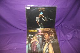 A lof of two albums by Tom Waits