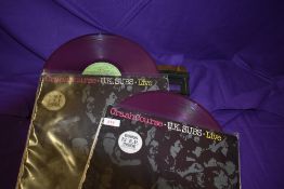 Two copies of the UK Subs Live on coloured vinyl - both have the bonus 12'