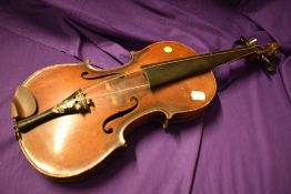 A traditional violin having 14in 2 piece back , mother of pearl inlay to tail piece