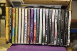 A lot of twenty rock , indie and metal compact discs