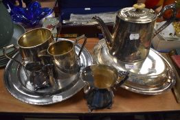 A selection of silver plated wares including lidded server and teapot