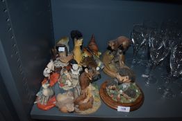 A selection of figures and figurines including Border fine arts and Country Artists