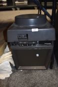 A Belle Howell auto focus slide projector with viewing screen and built in tape deck.