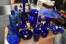 A good selection of Bristol blue glass wares including footed bowl and art glass