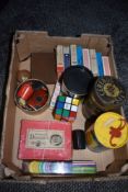 A selection of games and playing cards including Rubix cube