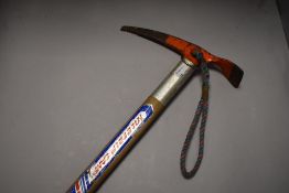 A carbon steel ice pick or axe