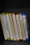 Eight A Wainwright guides to the lake district.