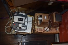 A Plus O Matic D Deluxe film projector and a similar slide viewer by Colorslide