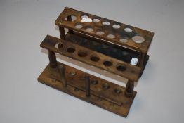 A set of two vintage laboratory test tube racks