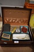 A selection of vintage costume jewellery and trinkets in leather case