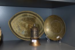 A selection of middle eastern Islamic or similar metal wares including chase work bowl and prayer