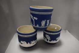 A pair of ceramic platers by Adams in a Jasperware design and a similar Adams planter