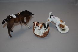 Three figure studies of animals including Doulton dogs and Beswick horse