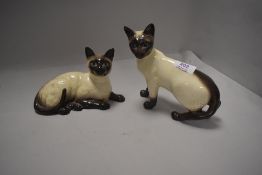 Two ceramic figures of Siamese cats by Royal Doulton