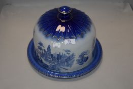 A porcelain flow blue cheese dome by Venitian pottery dome and base both good condition