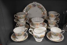 A part tea service by Paragon in the Country Lane design