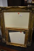 Two gilt effect picture or mirror frames