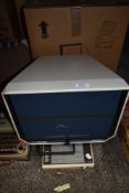 An Eyecom 2000 desktop microfische reader with box.