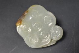 A Chinese sun jade carving.