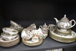 A part dinner service, Coalport AD1750, having oriental floral transfer pattern and gilt key type