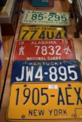 A selection of American car or vehicle number or license plates including New York
