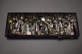 A selection of collectable souvenir tea spoons some with enamel crest