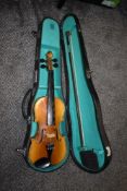 A modern music violin in fitted case by Lark