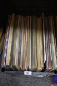 A selection of vinyl record albums of mixed interest
